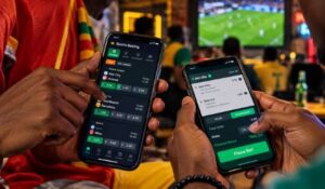 Youth Sports Betting in Africa with young football fans using mobile betting